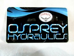 Osprey Hydraulics Sticker Decal Label 3″ Wide X 1.75″Tall Black & Blue