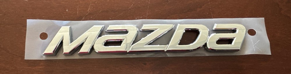 Mazda Chrome “Mazda” Trunk Emblem OEM NEW 2014-2016 Mazda 6 – GHK1-51-711 –