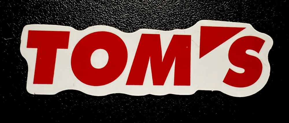 TOM’S Toyota Racing sticker *Glossy*Red. Approx Size: 3-1/4”X 1” Self Adhesive