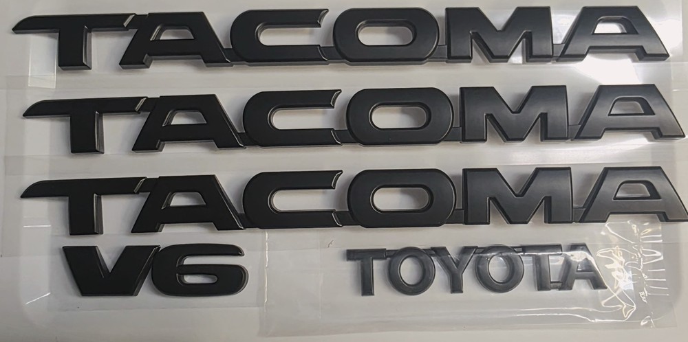 TOYOTA TACOMA EMBLEMS 5 PCS SET/ DOORS AND TAILGATE BLACK MATTE ABS DECALS NEW