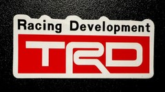TRD Racing Development Sticker Approx Size 3-3/8”X 1-1/2” Matte Flat Finish.