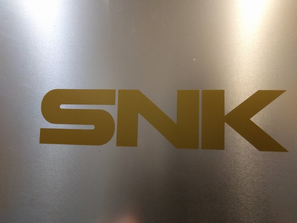 2 pack SNK text logo Vinyl sticker Gold Metallic 7 3/4″ x 1 3/4″ ( 200mm x 36mm)