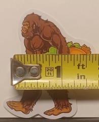 Bigfoot/Sasquatch Cryptid With A Taco Glossy Decal Sticker. 2.25″ Tall×2″ Wide