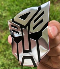(2 PACK) ALUMINUM Transformers Autobots Optimus Prime Car Sticker Decal Emblem