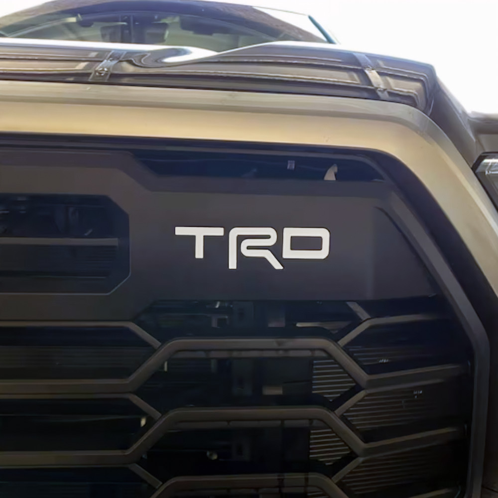 VINYL – GLOSS WHITE TRD UPPER FRONT GRILLE LETTERS FITS TUNDRA 2022-2025