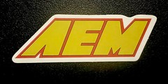 AEM Electronics Sticker Glossy Finish Approx Size 3-1/2”X 1”. self adhesive